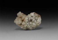 Natural History - Freiberg Rock Salt Mineral Specimen
. A specimen comprising numerous cubic crystals of halite (rock salt) from the famous Freiberg,...