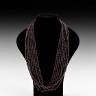 Natural History - Garnet Bead String Group
. A group of eight strings of polished irregular garnet beads. 469 grams total, 84-90cm (33 - 35 1/2"). Pr...
