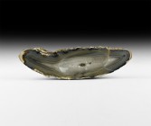 Natural History - Polished Agate Trinket Dish
. An elongated dish of natural agate with central scoop, filled with quartz crystals; polished upper an...