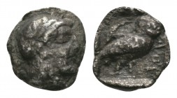 Ancient Greek Coins - Attica - Athens - Owl Obol
After 409 BC. Obv: head of Athena right. Rev: owl right with ??? before. SNG Cop. 53-65. 0.55 grams....