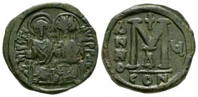 Ancient Byzantine Coins - Justin II and Sophia - Large M Follis
565-578 AD. Constantinople mint, year 5. Obv: IVSTINVS PP AV legend with Justin left ...