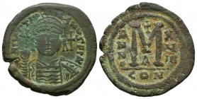 Ancient Byzantine Coins - Justinian I - Large M Follis
527-565 AD. Constantinople mint. Obv: IVSTINIANVS P P AVG legend with helmeted and cuirassed b...