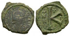 Ancient Byzantine Coins - Justin II - Large K Half Follis
565-578 AD. Antioch mint. Obv: DN IVSTINVS PP V legend with helmeted and cuirassed bust fac...