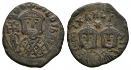 Ancient Byzantine Coins - Theophilus - Triple Portrait Follis
830-842 AD. Syracuse mint. Obv: ???FIL?S bAS legend with bust facing wearing crown and ...