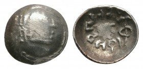 World Coins - Arabia - Himyarite - Scyphate Unit
1st-2nd century AD. Obv: bust right with trident behind. Rev: small bust right with Himyarite legend...