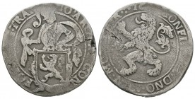 World Coins - Netherlands - Utrecht - Lion Daalder
1606-1634 AD. Obv: standing figure supporting arms with MO ARG PRO CONFOE BELG TRAI legend. Rev: l...