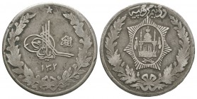 World Coins - Afghanistan - Amanullah - 1302 AH - 2½ Rupees
Dated 1302 AH (1923 AD"). Obv: star above toughra with date below within wreath. Rev: ins...