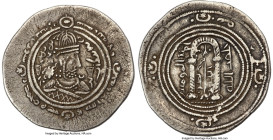 Umayyad Caliphate. Abd al-Malik (AH 65-86 / AD 685-705). AR drachm (30mm, 3.51 gm, 9h). VF. Uncertain mint, possibly Damascus. AH 75 (ca. AD 693-694)....