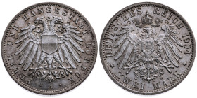 Lübeck 
2 Mark
1904
A Berlin

Vs: Doppelköpfiger Wappenadler der Stadt Lübeck mit Brustschild, unten Münzstättenbuchstabe, Umschrift "FREIE UND H...