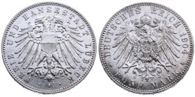 Lübeck 
5 Mark
1904
A Berlin

Vs: Doppelköpfiger Wappenadler der Stadt Lübeck mit Brustschild, unten Münzstättenbuchstabe, Umschrift "FREIE UND H...