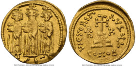 Heraclius with Heraclius Constantine, and Heraclonas (AD 632-641). AV solidus (20mm, 4.38 gm, 7h). NGC Choice VF 3/5 - 2/5, graffito . Constantinople,...