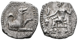 Greek LYCAONIA. Laranda. Circa 324/3 BC. Obol (Silver). Baal seated left, holding grain ear and grape bunch in extended right hand, scepter with his l...