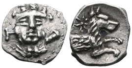 LYCAONIA. Laranda. Obol (Circa 324/3 BC). Obv: Facing head of Herakles, with club over shoulder; H to left. Rev: Forepart of wolf right; star above. G...