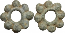 Celtic World. AE Ring money with eight pellets, ca. 1st century AD. AE. g. 9.97 mm. 27.00 Earthy green patina. VF.