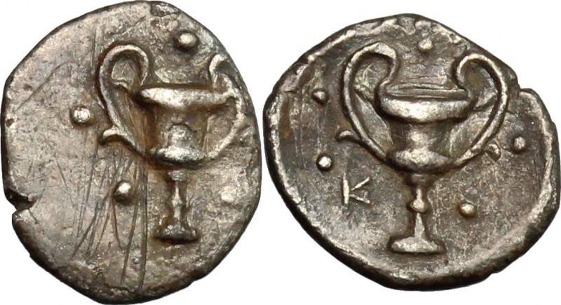 Greek Italy. Southern Apulia, Tarentum. AR Obol, 280-228 BC. D/ Kantharos surrou...
