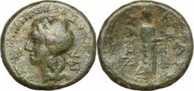 Sicily. Catana. AE Hexas, c. 400 BC. D/ Head of Apollo left, laureate. R/ Isis standing right, holding bird (dove?). SNG ANS 1284. AE. g. 3.94 mm. 11....
