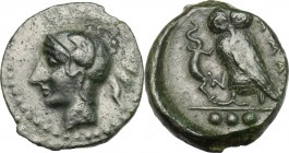 Sicily. Kamarina. AE Tetras, 410-405 BC. D/ Head of Athena left, helmeted. R/ Owl standing left, holding lizard; in exergue, three pellets. CNS III, 2...