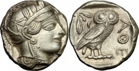 Continental Greece. Attica, Athens. AR Tetradrachm, c. 454-404 BC. D/ Helmeted head of Athena right, with frontal eye. R/ Owl standing right, head fac...