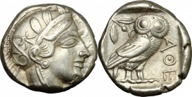 Continental Greece. Attica, Athens. AR Tetradrachm, c. 454-404 BC. D/ Helmeted head of Athena right, with frontal eye. R/ Owl standing right, head fac...