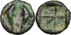 Continental Greece. Islands off Attica, Aegina. AE 12mm, 370-350 BC. D/ Two dolphins,. R/ Incuse suare with 5 fields. SNG Cop. 533. AE. g. 1.29 mm. 12...