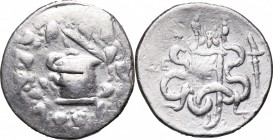 Greek Asia. Ionia, Ephesos. AR Cistophor, 132-67 BC. D/ Cista mystica with snake, within wreath. R/ Two snakes coiled; between, bow-case; to right, to...
