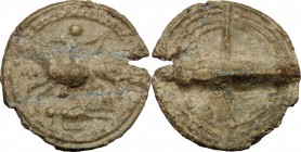 PB Tessera, c. 1st century AD. D/ Horseman left; below laying (dead?) person. R/ Shield. PB. g. 10.24 mm. 28.00 About VF.