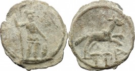 PB Tessera, c. 1st century AD. D/ Soldier or Mars standing right; leaning on sceptre. R/ Wolf running right; below, TPA. Rostowzew 186. PB. g. 3.45 mm...