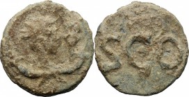 PB Tessera, c. 1st century AD. D/ Bust right, radiate, draped, set on two crossed cornucopiae, holding caduceus. R/ SCO. PB. g. 4.29 mm. 19.00 About V...