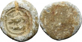 PB Tessera, c. 1st century AD. D/ Eagle (?) standing right, head lowered; below, pray (fish?). R/ Blank. PB. g. 3.89 mm. 16.00 VF.