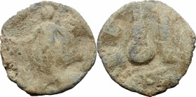 PB Tessera, c. 1st century AD. D/ Naked figure standing left. R/ Uncertain. PB. g. 6.06 mm. 23.00 Good F/F.