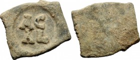 PB Tessera, 3rd-4th century AD. D/ AC / AL. R/ Blank. cf. London Ancient Coins Ltd. Auction 60/402. PB. g. 5.70 mm. 23.00 Round die on irregular recta...