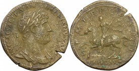 Hadrian (117-138). AE Sestertius, 121-122. D/ Bust right, laureate, cuirassed. R/ Emperor in military attire on horse prancing left, raising right han...
