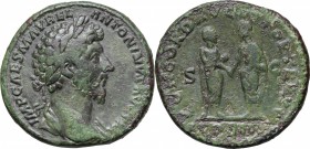 Marcus Aurelius (161-180). AE Sestertius, 161 AD. D/ Bust right, laureate, draped. R/ Marcus Aurelius and Lucius Verus standing facing each other, cla...