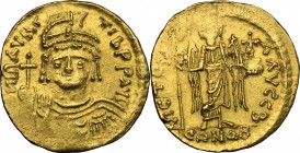 Maurice Tiberius (582-602). AV Solidus, Constantinople mint, 583-602. D/ Bust facing, helmeted, holding globus cruciger. R/ Victoria standing facing, ...