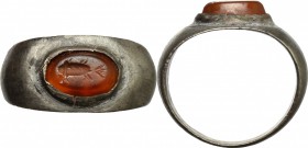 Silver ring with carnelian gem engraved with fish.
 Roman period, I-II century AD.
 Size 15 mm.