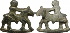 Bronze fibula in the shape of horse with rider.
 Roman period, 1st-3rd century AD.
 30 x 29 mm.