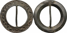 Bronze belt's buckle decorated with griffins and flowers.
 Central Europe, 15th-17th century AD.
 Diameter 61 mm.