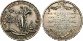 Netherlands. AR Medal 1771. D/ Female figure standing left, holding two hearts in a bowl and two cornucopiae; to right, tree and bunch of corn-ears; t...