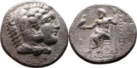 Alexander III (336-323 BC) Tetradrachm Obverse: Head of Herakles to right, wearing lion skin headdress Rev: Zeus seated left on low throne, holding lo...
