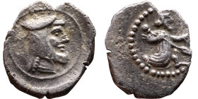 Asia Minor, Uncertain Achaemenid mint, (4th century BC) AR Obol Obverse: Persian king, in kneeling-running stance, holding spear and bow. Reverse: Hea...