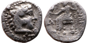 Alexander III (336-323 BC) Obol Obverse: Head of Herakles to right, wearing lion skin headdress Rev: Zeus seated left on low throne, holding long scep...