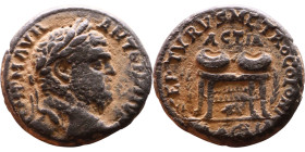 Caracalla (211-217) Phoenicia: Tyre. Bronze coin. Obv: Bust of emperor Rev: Agonistic table surmounted by two prize urns; palm to either side, murex s...