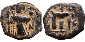 Constans II (641-668) Follis. Obverse: Imperial figure holding cross and globus Reverse: m and inscription

Weight:21mm 3,21g

Artificial sand pat...