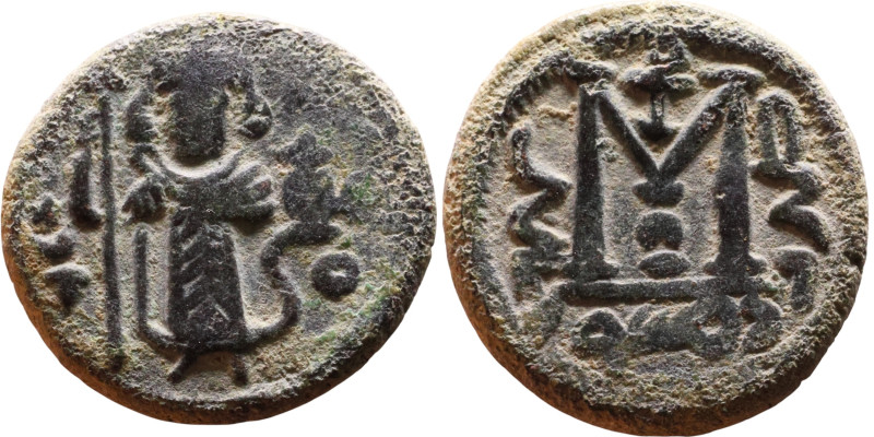 al-Malik ibn Marwan (687-705), Byzantine style folis Obverse: Imperial figure ho...