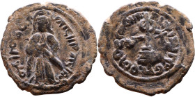 al-Malik ibn Marwan (687-705) Follis. Obverse: Standing caliph Reverse: Modified cross potent set on steps

Weight:22mm 3,65g