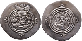Khosrow II (591-628) Drachm Obv: Bust of a king wearing a winged crown, turned to the right. Rev: Blazing altar of fire situated between two guards
...