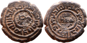 Umayyad/Abbasid. Bronze coin. Obverse: Arabic inscription. Reverse: Arabic inscription

Weight:20mm 6,96g