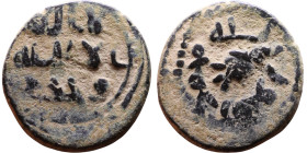 Umayyad/Abbasid. Bronze coin. Obverse: Arabic inscription. Reverse: Arabic inscription

Weight:18mm 3,81g

Artificial sand patina