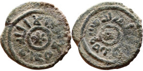Umayyad/Abbasid. Bronze coin. Obverse: Arabic inscription. Reverse: Arabic inscription

Weight:16mm 2,29g