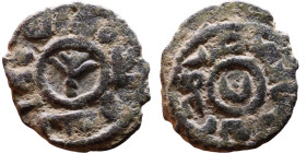 Umayyad/Abbasid. Bronze coin. Obverse: Arabic inscription. Reverse: Arabic inscription

Weight:16mm 2,11g